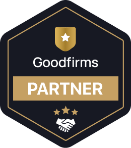 A hexagonal badge with a gold shield and star at the top, the words "Goodfirms PARTNER" in the center, and an icon of shaking hands with three stars below. The badge colors are black, gold, and white.